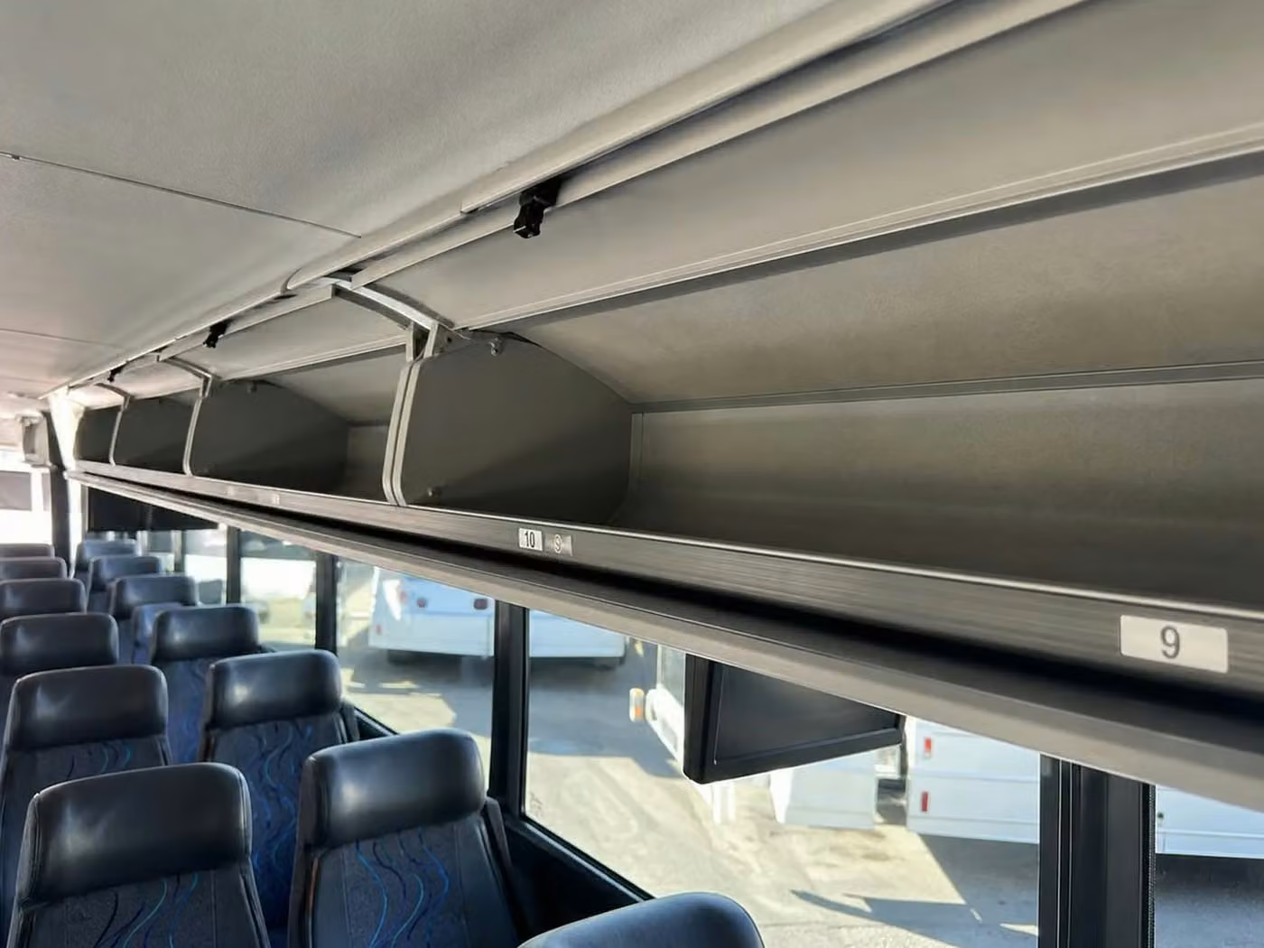 saratoga 18 passenger minibus overhead storage