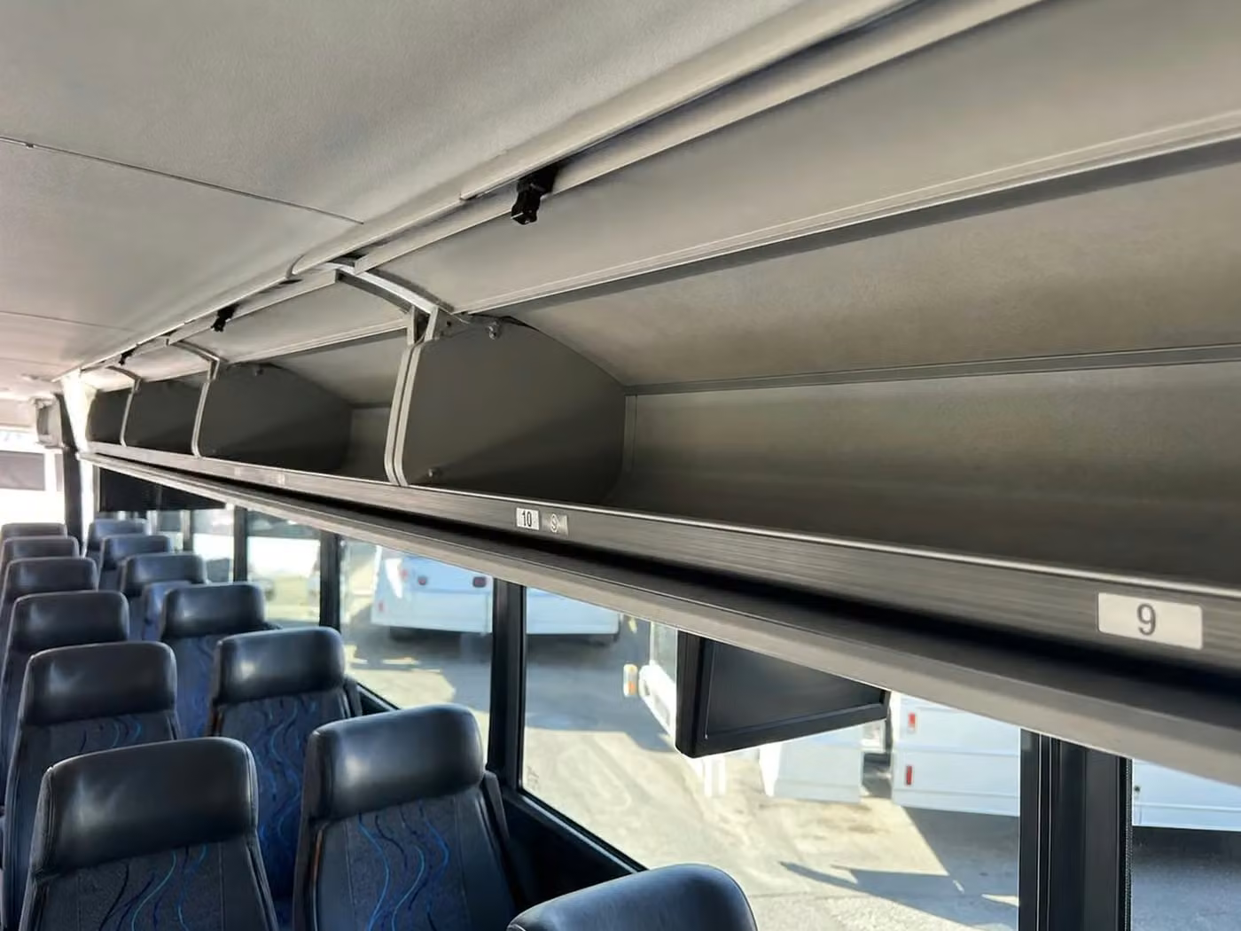 saratoga 28 passenger minibus overhead storage