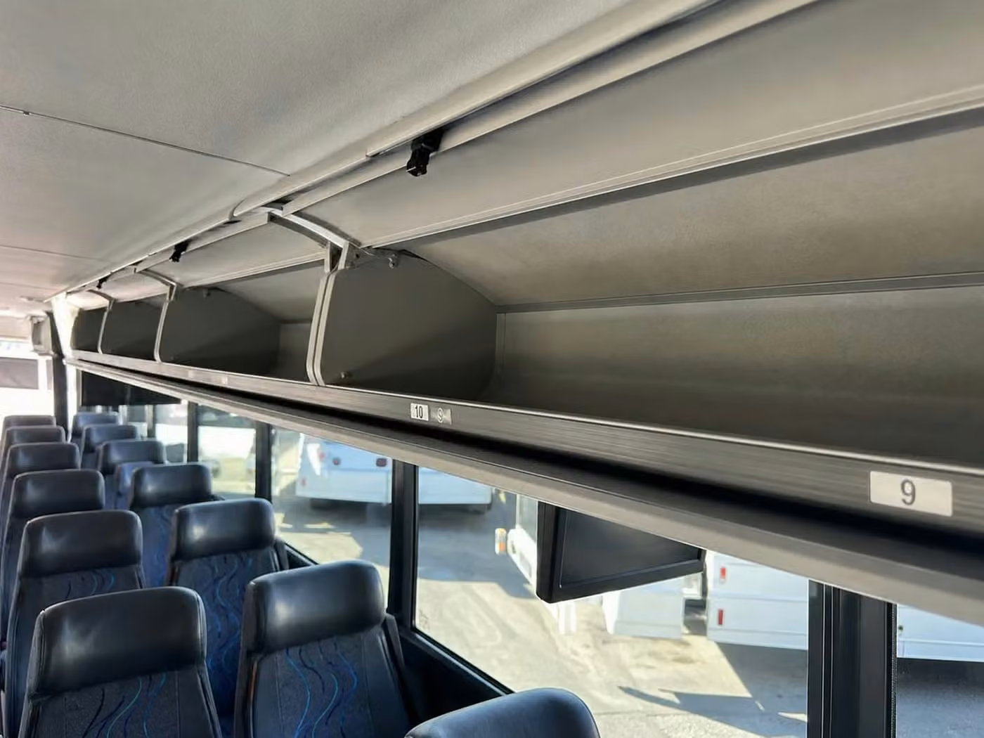 saratoga 35 passenger minibus overhead storage